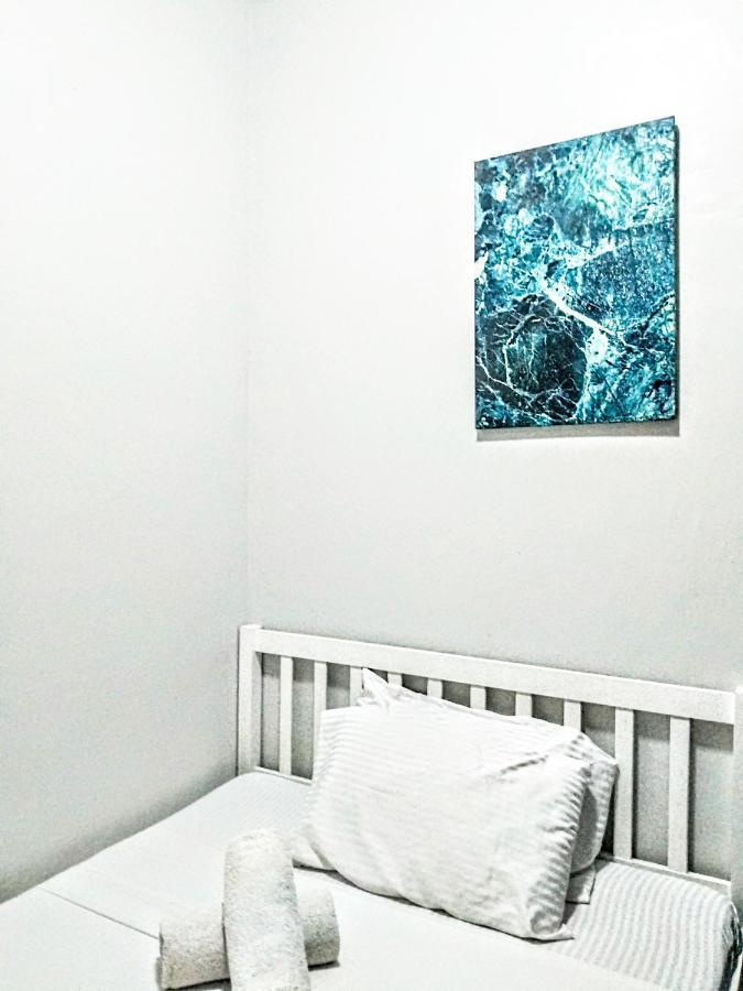 Hometel Barrio House Mactan Мактан Экстерьер фото